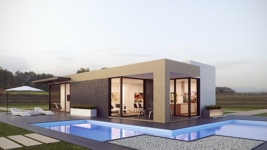 Casa prefabricada con piscina y jardín